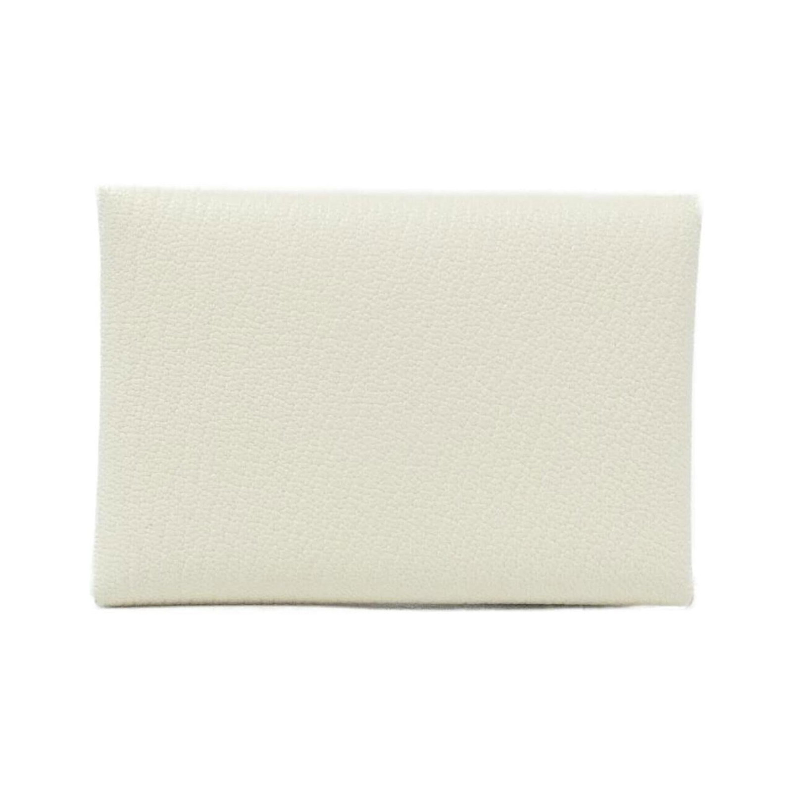 Hermes Coin Case Leather Purse Chevre: Hermes Coin Case Leather Purse Chevre Chevre leather provides a rich, textured finish to this elegant coin case purse from Hermes. Measuring 7cm x 10cm x 1.5cm, its compact size makes it a versatile