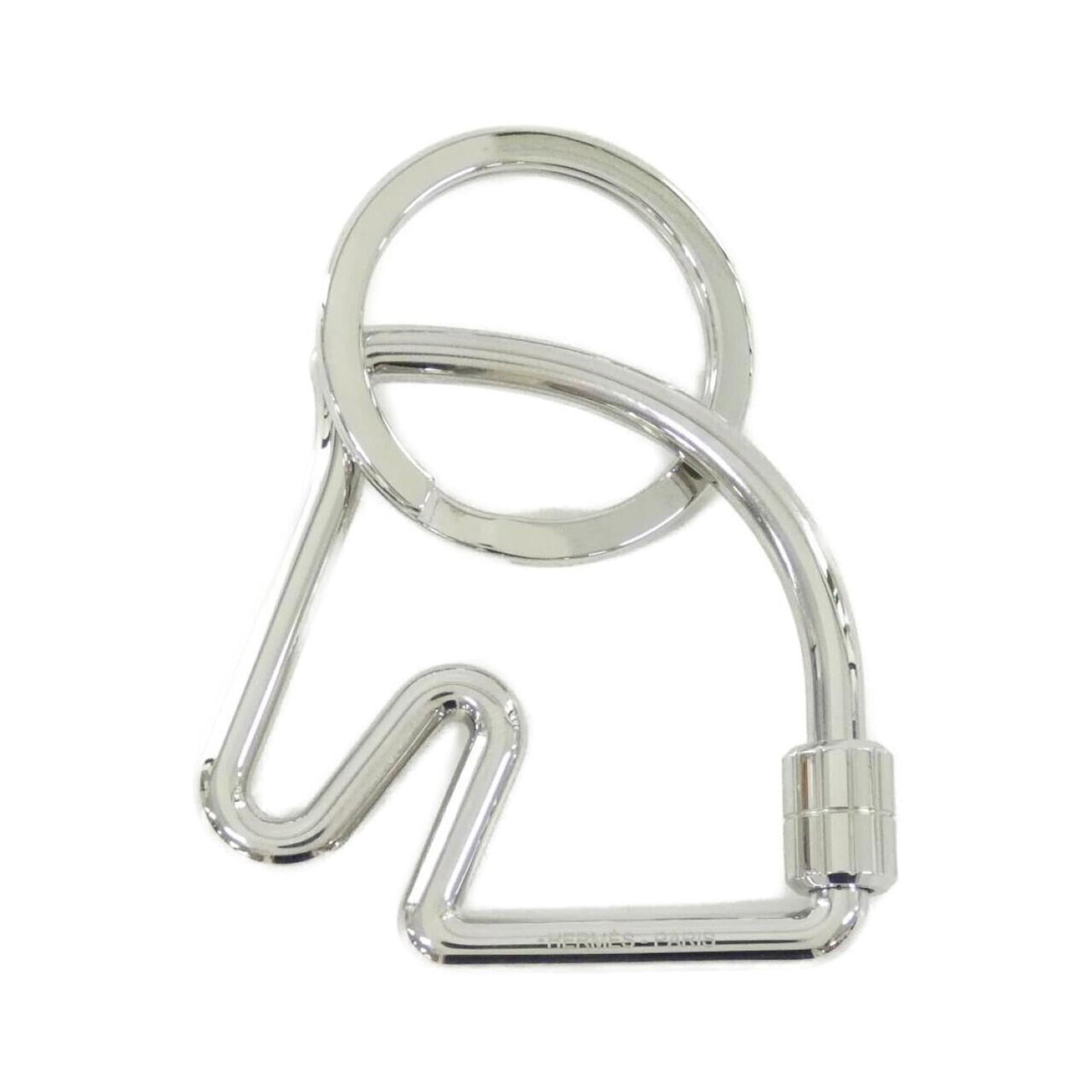 Steel Keyring Hermes: Steel Keyring Hermes Silver stainless steel keyring from Hermes, a stylish accessory for everyday use. Made from durable stainless steel, this keyring features a sleek and modern design. Item Specific