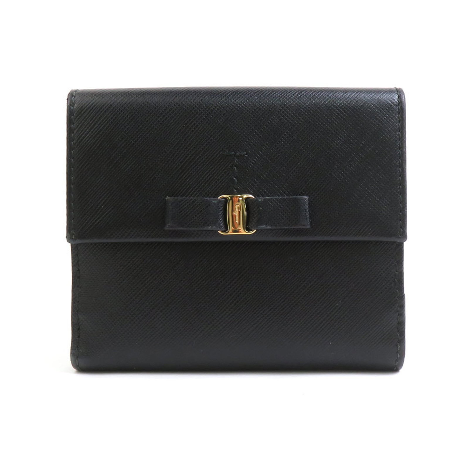 Salvatore Ferragamo Leather Wallet Bi-Fold: Salvatore Ferragamo Leather Wallet Bi-Fold Salvatore Ferragamo Leather Wallet Bi-Fold is a sleek and sophisticated accessory, crafted from high-quality black leather. This bi-fold wallet features a