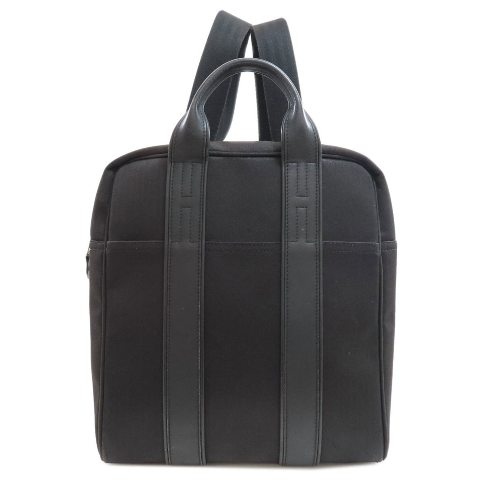 Chevron Hermes Backpack Toile: Chevron Hermes Backpack Toile Chevron Toile Backpack from the iconic Hermes Acapulco line, featuring a classic black chevron design on a high-quality Toile fabric. This stylish backpack boasts a