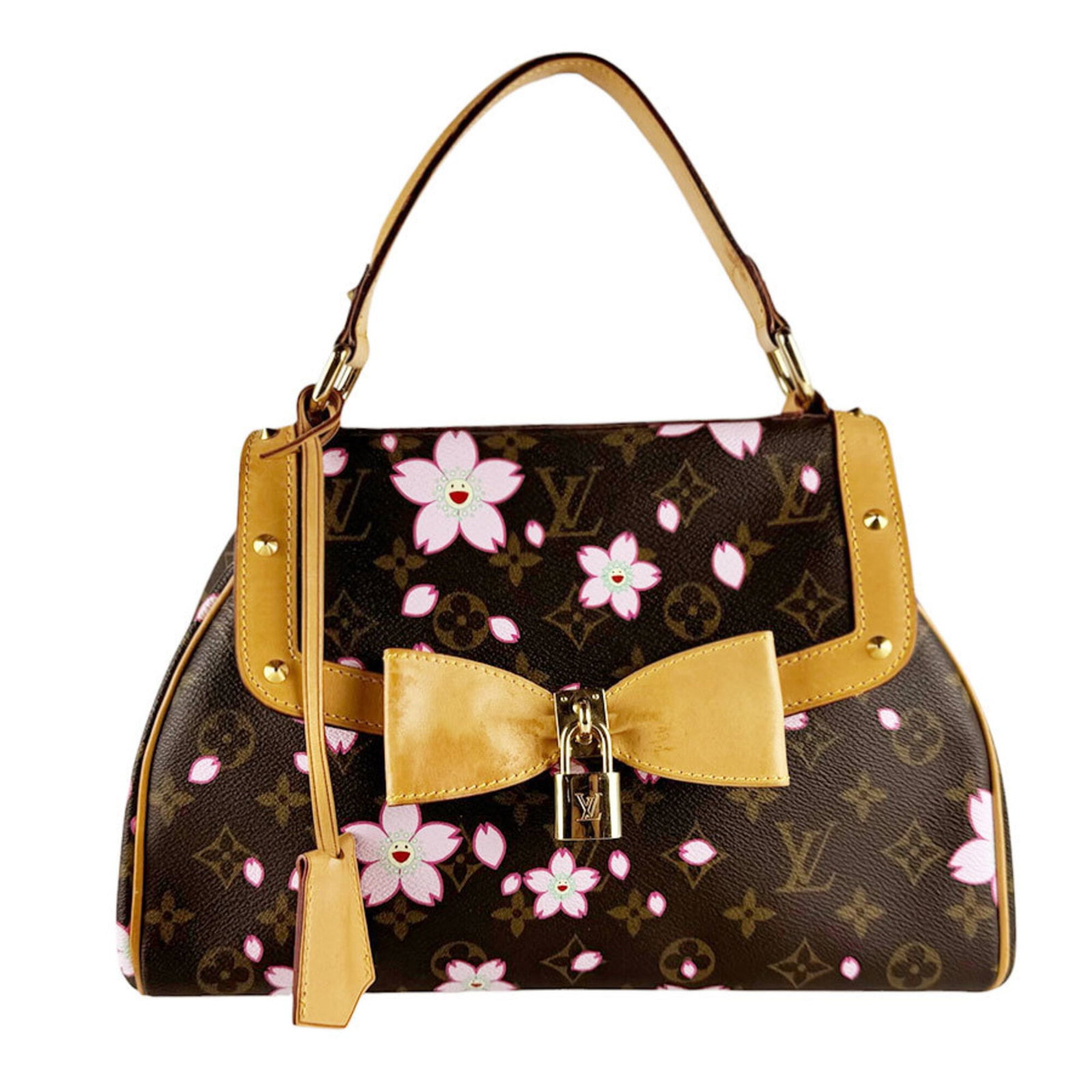 Louis Vuitton Monogram Handbag: Louis Vuitton Monogram Handbag Brown Monogram Louis Vuitton Handbag with Classic Design. This iconic handbag features the signature Louis Vuitton monogram pattern in a timeless brown color, crafted