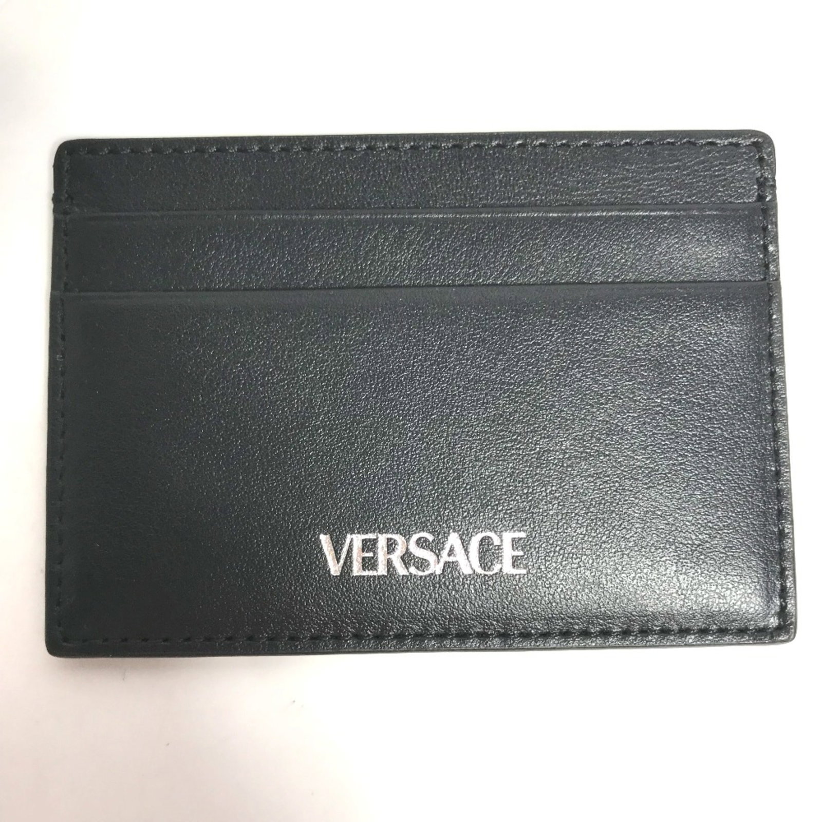 Card Case Versace Leather: Card Case Versace Leather Versace Leather Card Case - Sleek Black Design. Made from high-quality leather, this card case measures 10cm x 7cm (3.9 x 2.8 inches) and features a sophisticated black