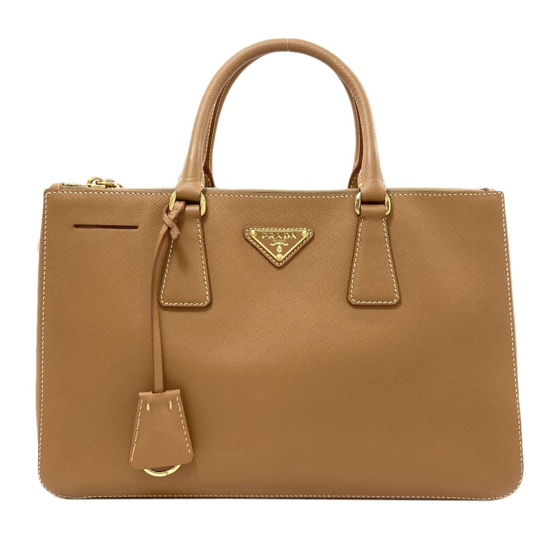 Safiano Galleria Handbag Prada Bn1293: Safiano Galleria Handbag Prada Bn1293 Safiano Galleria Handbag in Brown, a stylish and durable option from PRADA. Made with high-quality Safiano material, this handbag boasts a timeless design that