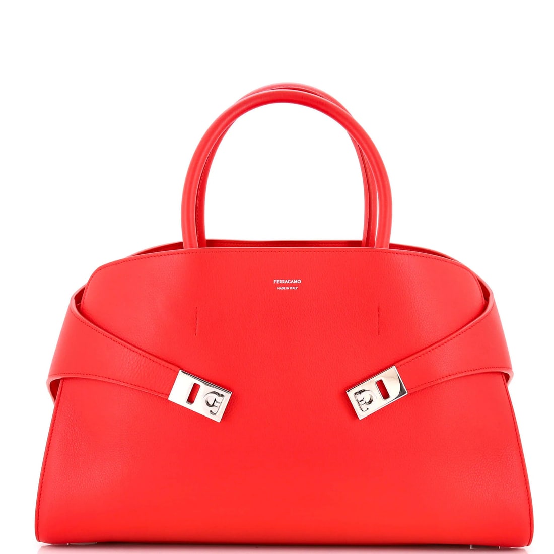 Handle Top Leather Large Salvatore Ferragamo Bag: Handle Top Leather Large Salvatore Ferragamo Bag Large Salvatore Ferragamo Bag with Red Leather Exterior. This iconic Hug Top Handle Bag features a classic design with a bold red leather exterior,