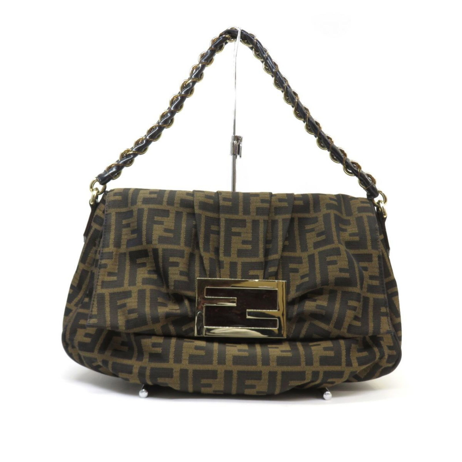 Shoulder Bag By Fendi: Shoulder Bag By Fendi Brown and Dark brown Fendi Shoulder Bag. This 20cm x 34cm x 11cm shoulder bag features a classic design with clean lines and a timeless silhouette. With its rich, luxurious