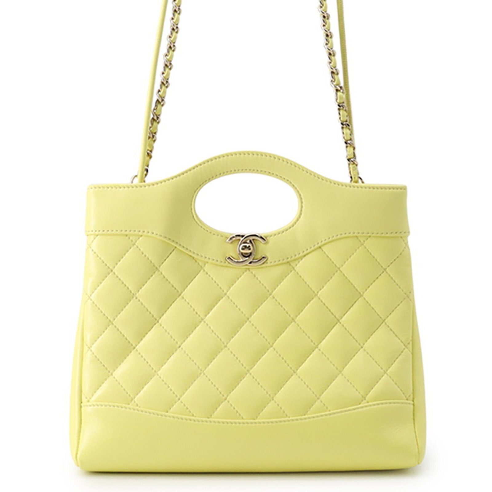 Shoulder Bag Leather Handbag Chanel: Shoulder Bag Leather Handbag Chanel This stylish shoulder bag features a beautiful yellow leather exterior and champagne gold hardware, adding a touch of elegance to any outfit. Made from