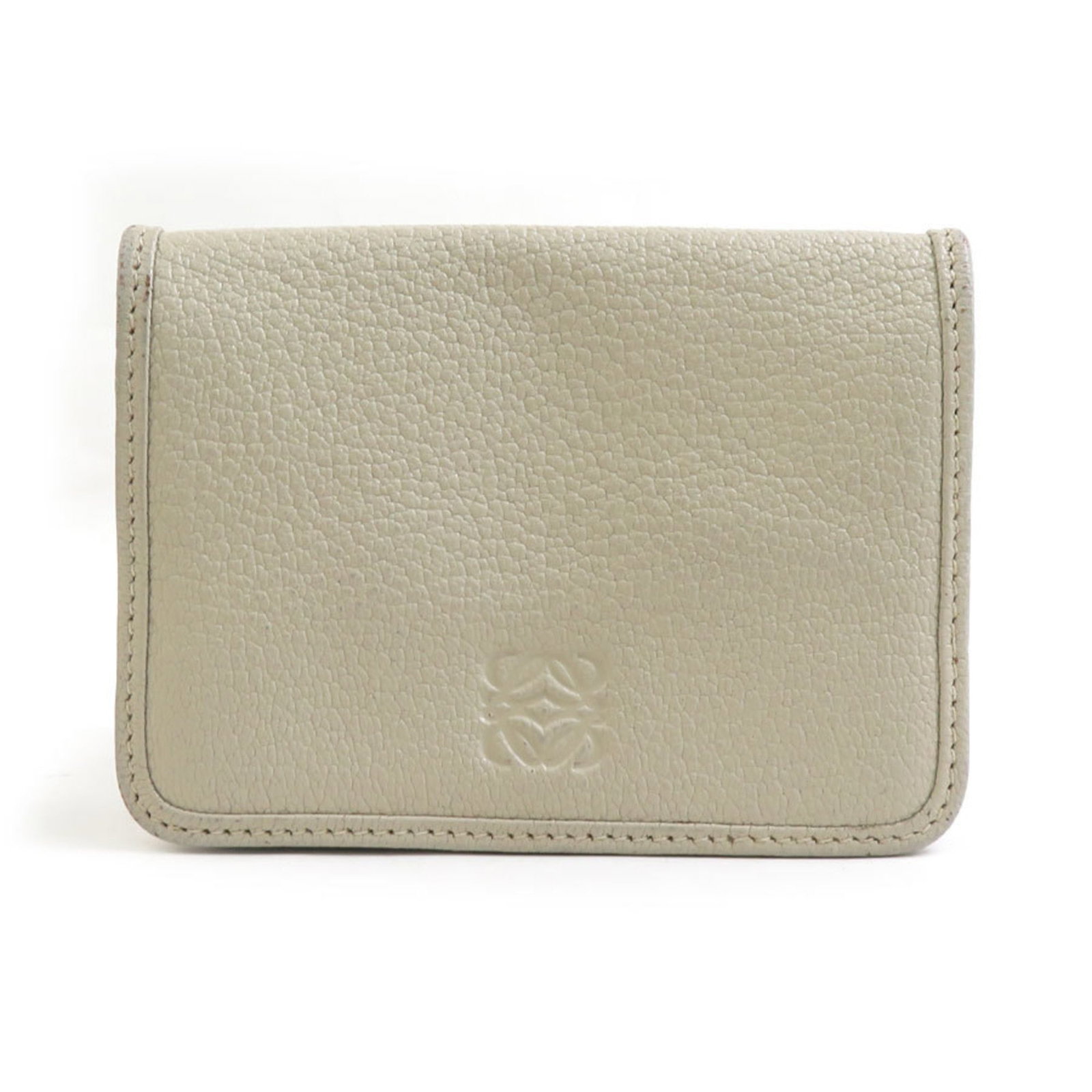 Loewe Coin Purse/ Coin Case Leather: Loewe Coin Purse/ Coin Case Leather Light beige Loewe leather coin purse/coin case with a compact size of 7.5cm x 10cm x 1.5cm, making it a practical and stylish accessory for everyday use. The coin