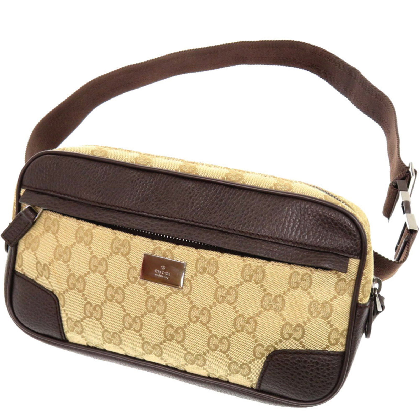 Canvas sling bag Gucci: Canvas sling bag Gucci Gucci canvas sling bag in beige, featuring the iconic GG canvas material. This stylish bag measures 14cm x 27cm x 5cm and is a compact, versatile accessory. The bag's signature 