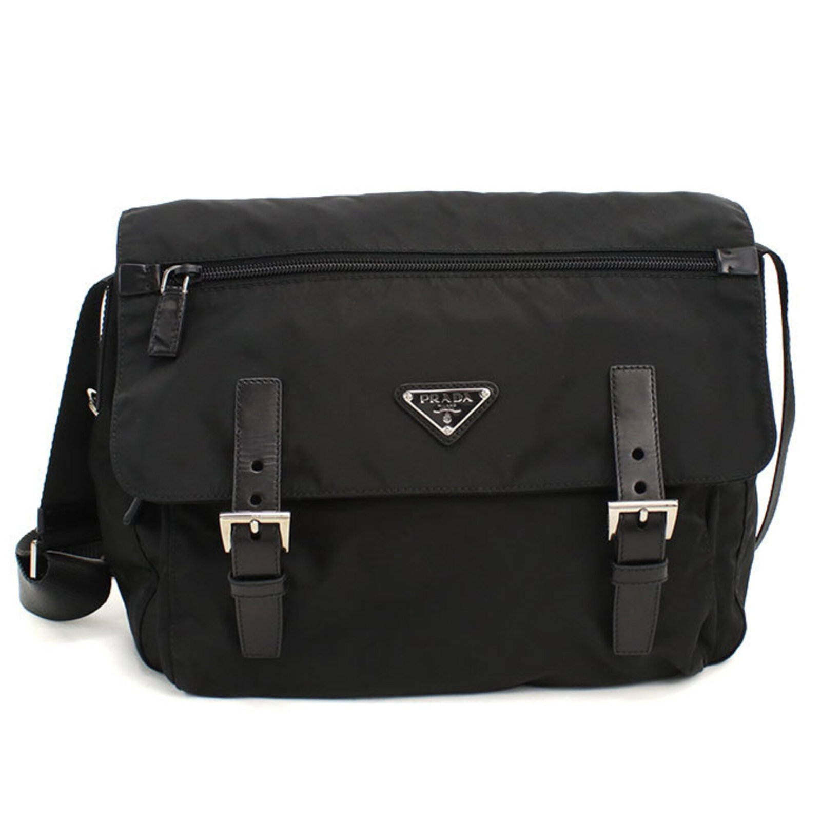 Shoulder Bag Nylon: Shoulder Bag Nylon The Prada Country shoulder bag is crafted from durable nylon, featuring a sleek black design with silver hardware. Measuring 26cm x 28cm x 12cm, this stylish bag is designed to be
