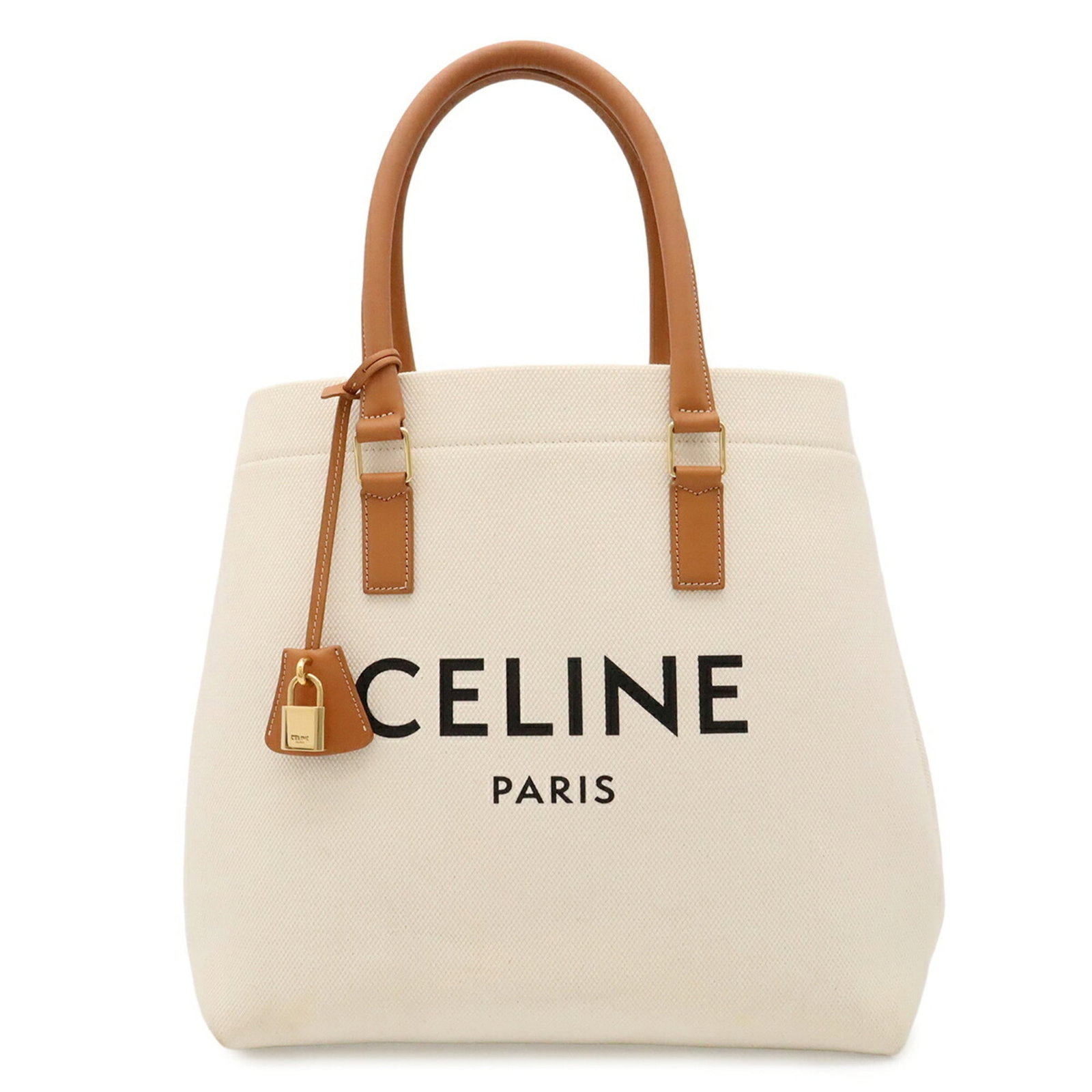 Canvas bag tote Celine: Canvas bag tote Celine Canvas bag tote from Celine, featuring a sturdy canvas material and a compact size of 33.5cm x 34cm x 20cm. The bag's design is characterized by its classic style, making it a