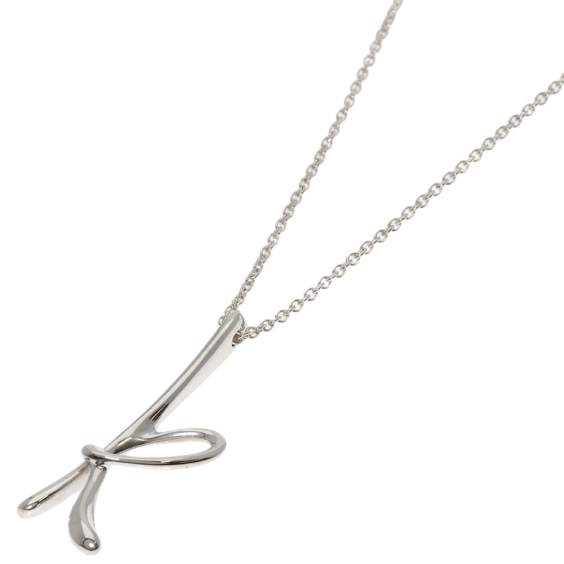 Tiffany Co Initial Silver Necklace: Tiffany Co Initial Silver Necklace Tiffany & Co's Initial Silver Necklace is a sleek and sophisticated piece, featuring a silver chain with a 15.9-inch length. The necklace boasts a striking silver fi