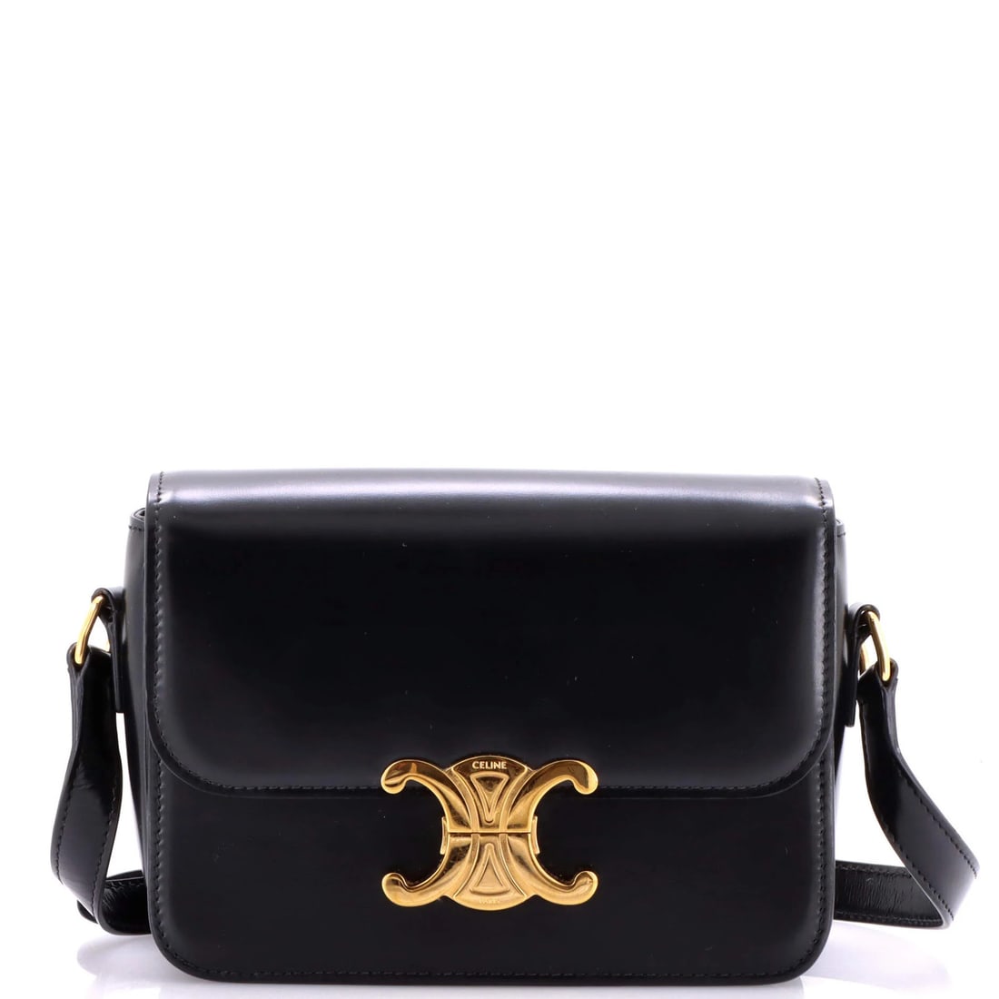 Calfskin Teen Shoulder Bag Celine Triomphe Smooth: Calfskin Teen Shoulder Bag Celine Triomphe Smooth Black Calfskin Celine Triomphe Shoulder Bag with Smooth Exterior, Gold Hardware, and Black Leather Interior. Measuring 5.5" in height, 7.5" in width, 