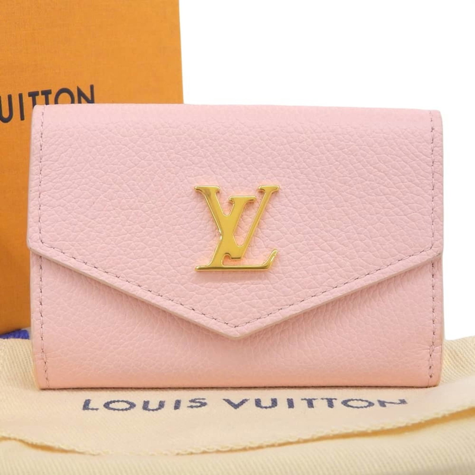 Louis Vuitton Wallet (Tri-Fold) Leather: Louis Vuitton Wallet (Tri-Fold) Leather Tri-fold leather wallet from Louis Vuitton, crafted from high-quality Taurillon leather in a soft pink hue. The wallet's sleek design and durable construction m