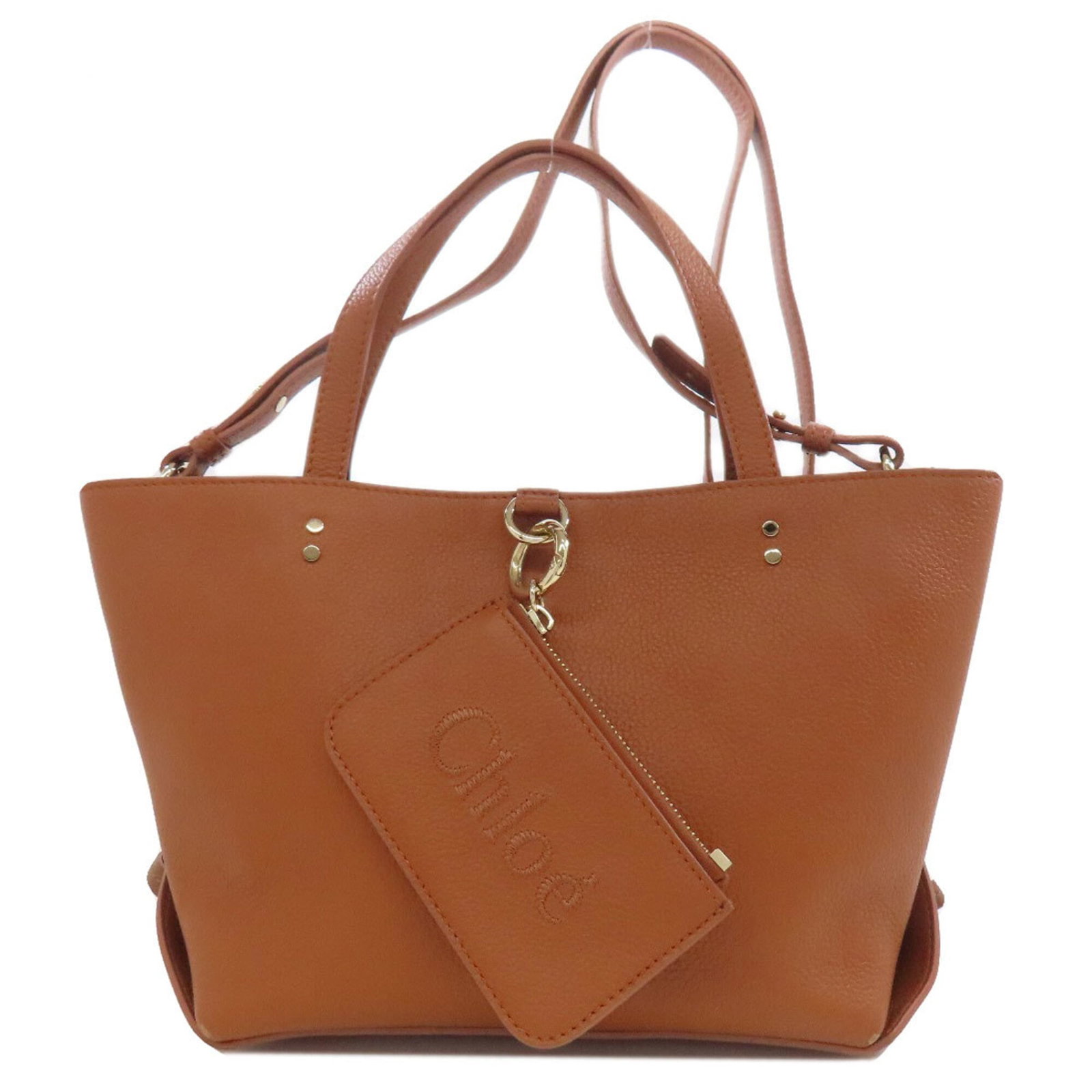 Handbag Leather by Chlo: Handbag Leather by Chlo Chlo's handbag boasts a rich, brown leather exterior, measuring 20cm x 35cm x 14cm. This stylish accessory is crafted from high-quality leather, with a classic design that