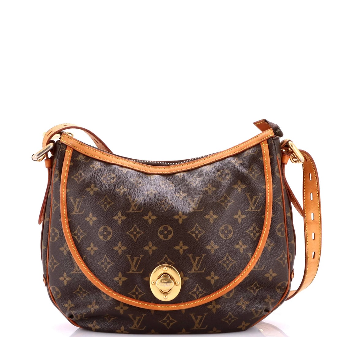 Handbag Canvas Monogram Louis Vuitton GM Tulum: Handbag Canvas Monogram Louis Vuitton GM Tulum Canvas Monogram Louis Vuitton GM Tulum Handbag in Brown. This iconic shoulder bag features the classic monogram canvas design, with scuffs, creases, and