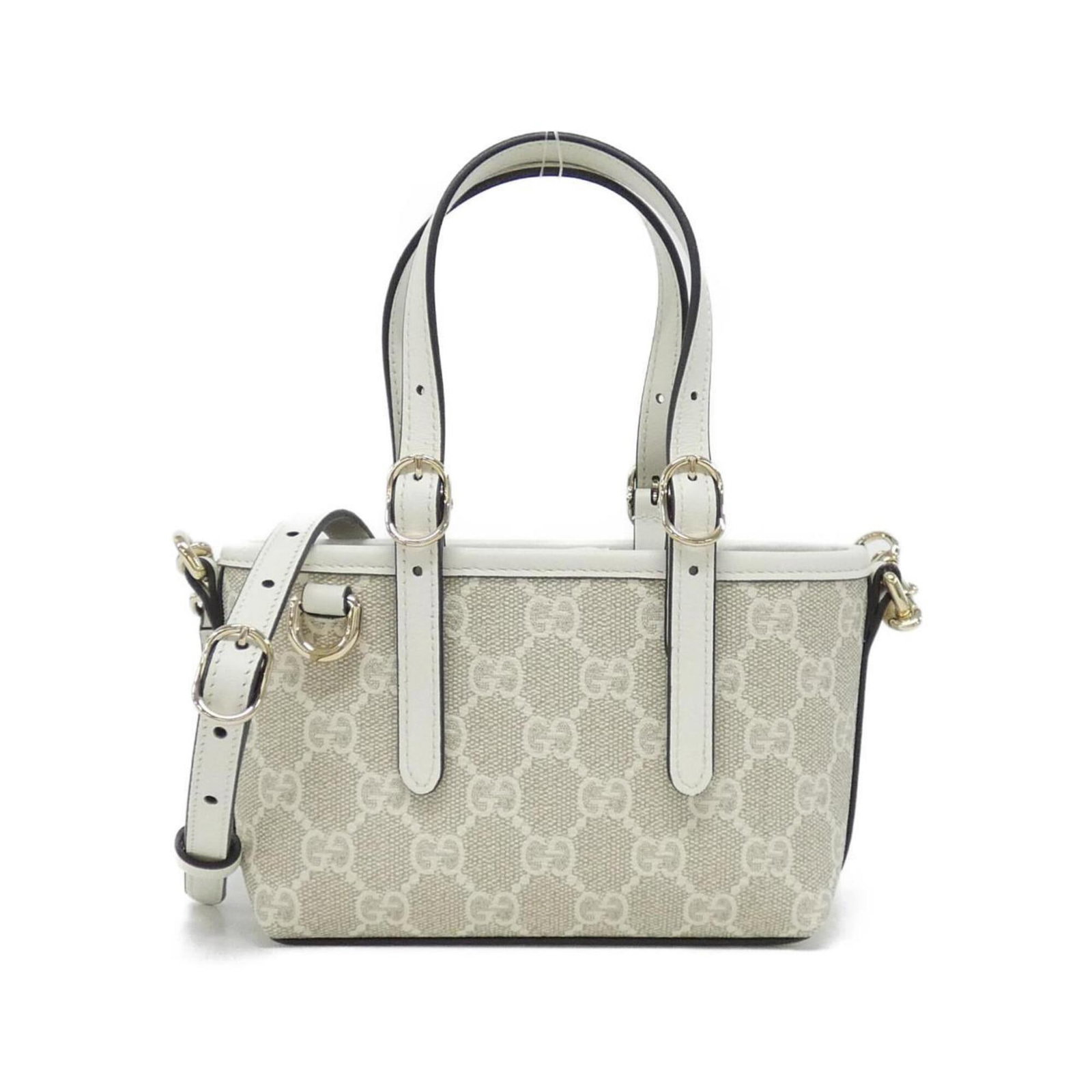 Canvas Leather Handbag Gucci: Canvas Leather Handbag Gucci Canvas Leather Handbag Gucci is a white, coated canvas and leather handbag with a size of 11cm x 15cm x 6cm. This stylish bag features a unique combination of materials