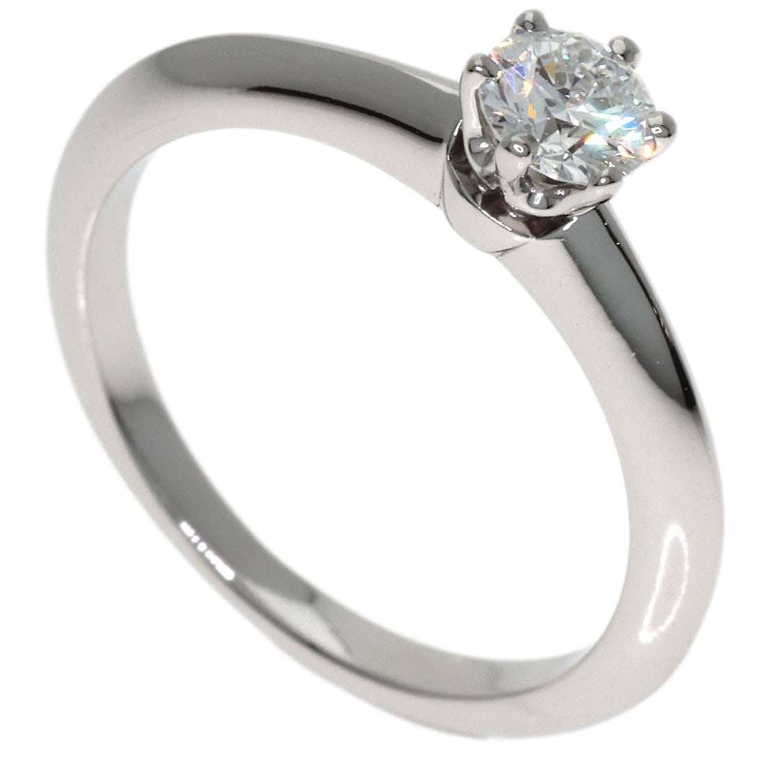 Tiffany&Co Platinum Solitaire Diamond Ring: Tiffany&Co Platinum Solitaire Diamond Ring Platinum Solitaire Diamond Ring from Tiffany&Co. features a silver metal platinum band and a diamond main stone, showcasing the luxury of Tiffany&Co.'s craft