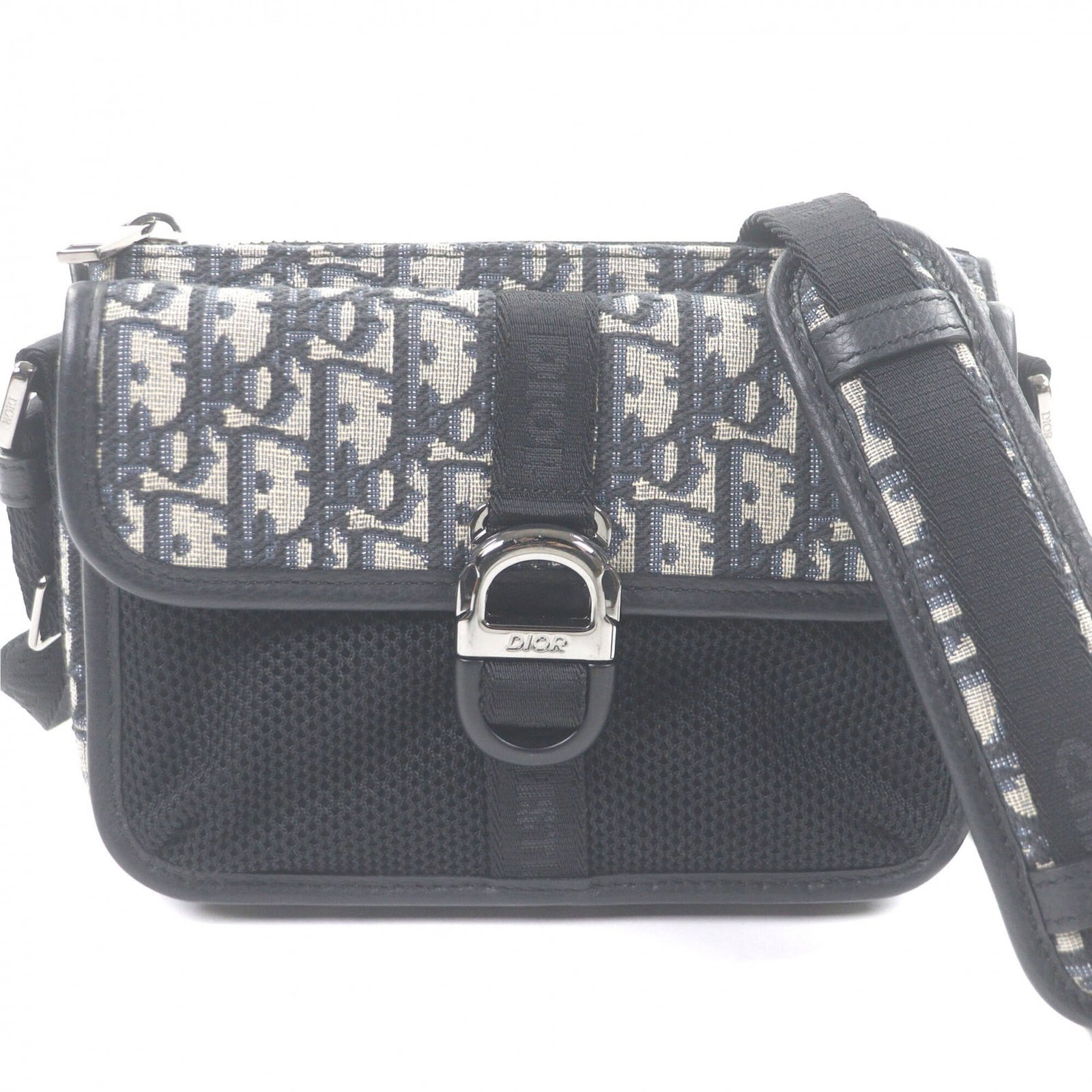 Shoulder Bag Canvas Leather Dior Homme: Shoulder Bag Canvas Leather Dior Homme Canvas and leather come together in this stylish shoulder bag from Dior Homme, a classic combination of textures and colors in beige. Measuring 15cm x 22cm x