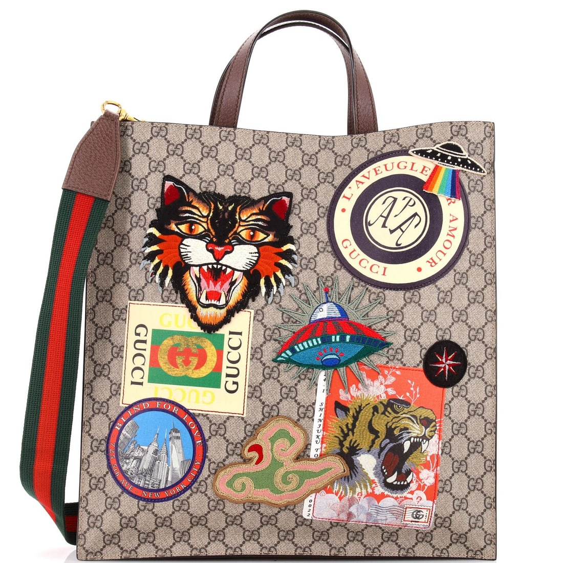 Soft Gucci Coated GG North Canvas Convertible Open Tote Applique With: Soft Gucci Coated GG North Canvas Convertible Open Tote Applique With Soft and stylish, this Gucci Coated GG North Canvas Convertible Open Tote features a unique applique design and a spacious