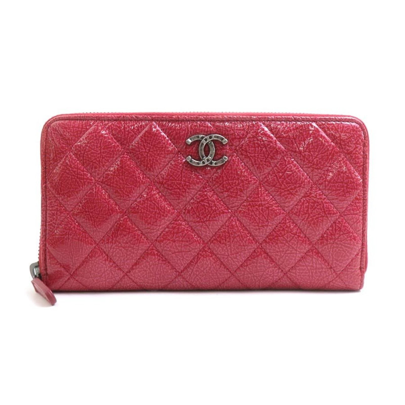 Patent leather bi fold wallet by Chanel: Patent leather bi fold wallet by Chanel Patent leather bi-fold wallet by Chanel features a striking pink color and sleek design. Made from high-quality patent leather, this long wallet boasts a