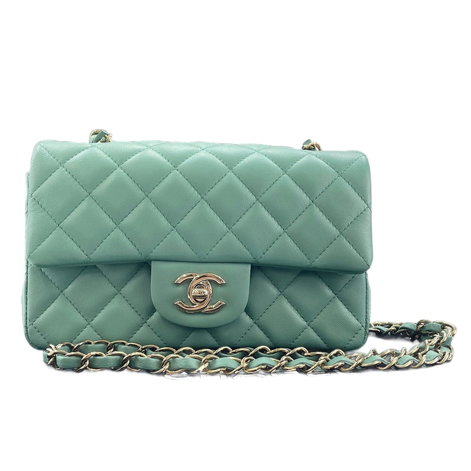Shoulder Bag by Chanel: Shoulder Bag by Chanel Chanel's iconic shoulder bag boasts a striking green hue, adding a pop of color to any outfit. Measuring 12cm x 20cm x 6cm, this compact bag is perfect for a night out or a