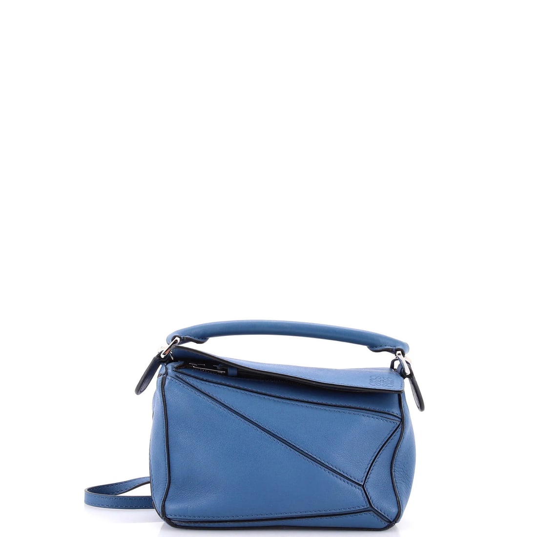 Loewe Puzzle Bag Leather Mini: Loewe Puzzle Bag Leather Mini The Loewe Puzzle Bag Leather Mini is a stylish cross body bag with a blue exterior and neutral interior. Noted for its distinctive puzzle design, this mini bag features