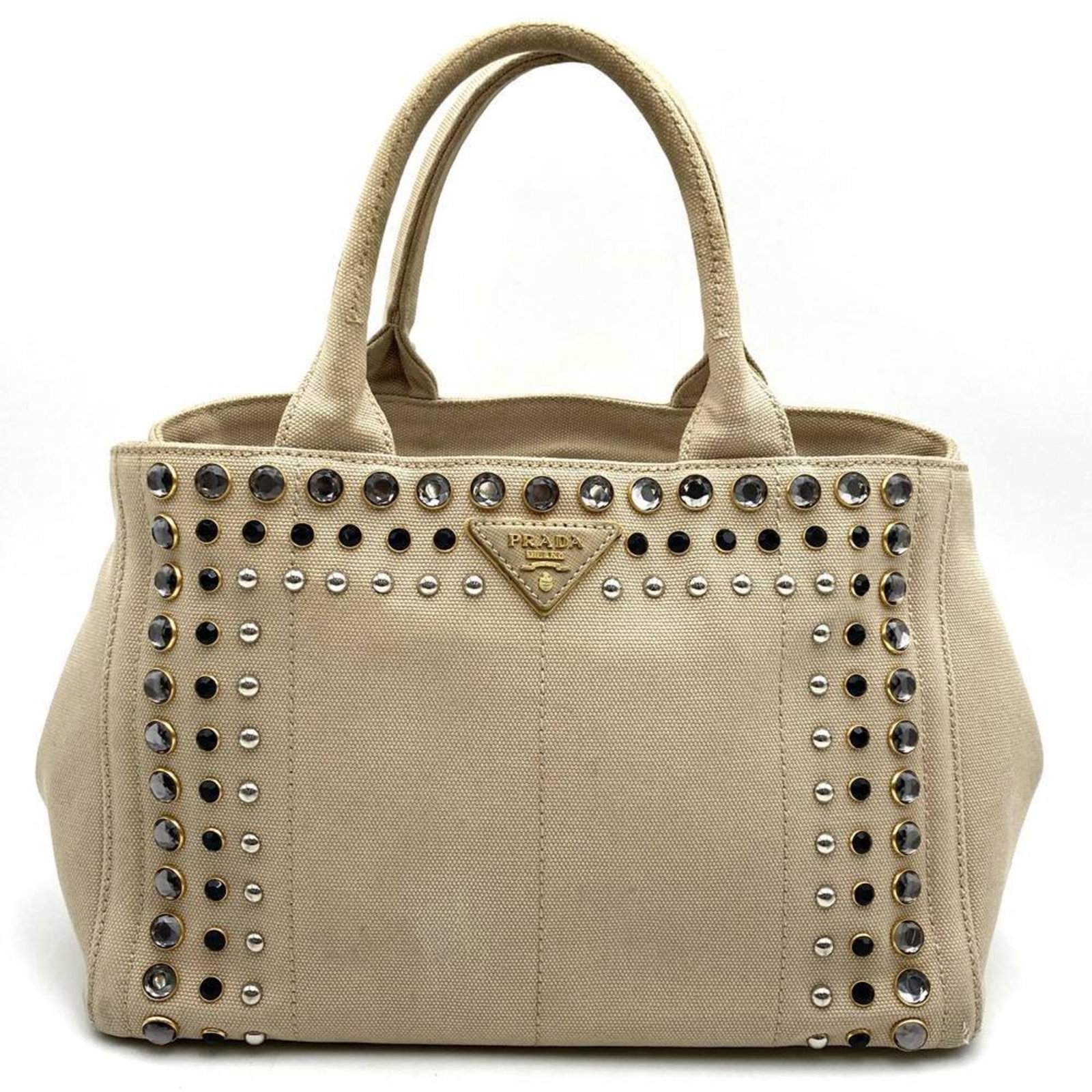 Canvas tote bag Prada handbag: Canvas tote bag Prada handbag Canvas tote bag Prada handbag, featuring a sturdy canvas material and a classic design, is available in beige and ivory colors. This open-top tote bag has a zipper