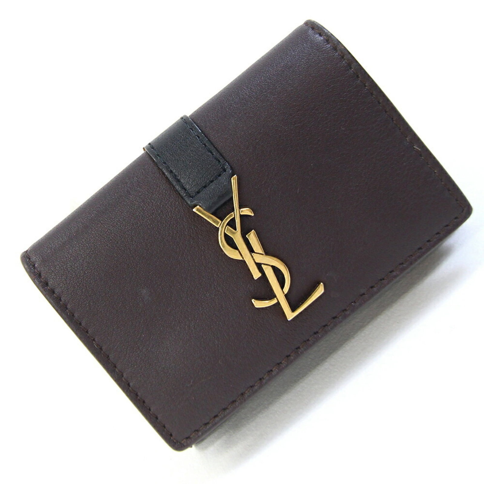 Saint Laurent Wallet (Tri-Fold) Leather: Saint Laurent Wallet (Tri-Fold) Leather Black or Dark Brown Saint Laurent Tri-Fold Leather Wallet. Made from high-quality leather, this tri-fold wallet features a sleek design with a compact size of