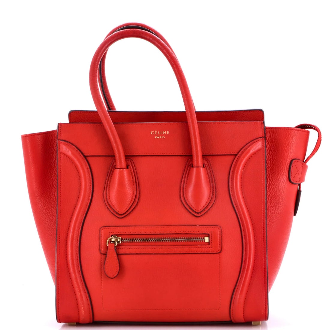 Luggage Bag Grainy Leather Micro Celine: Luggage Bag Grainy Leather Micro Celine This Celine Luggage Bag features a grainy leather exterior in a bold red color, with a micro size that makes it perfect for everyday use. The bag's exterior sho