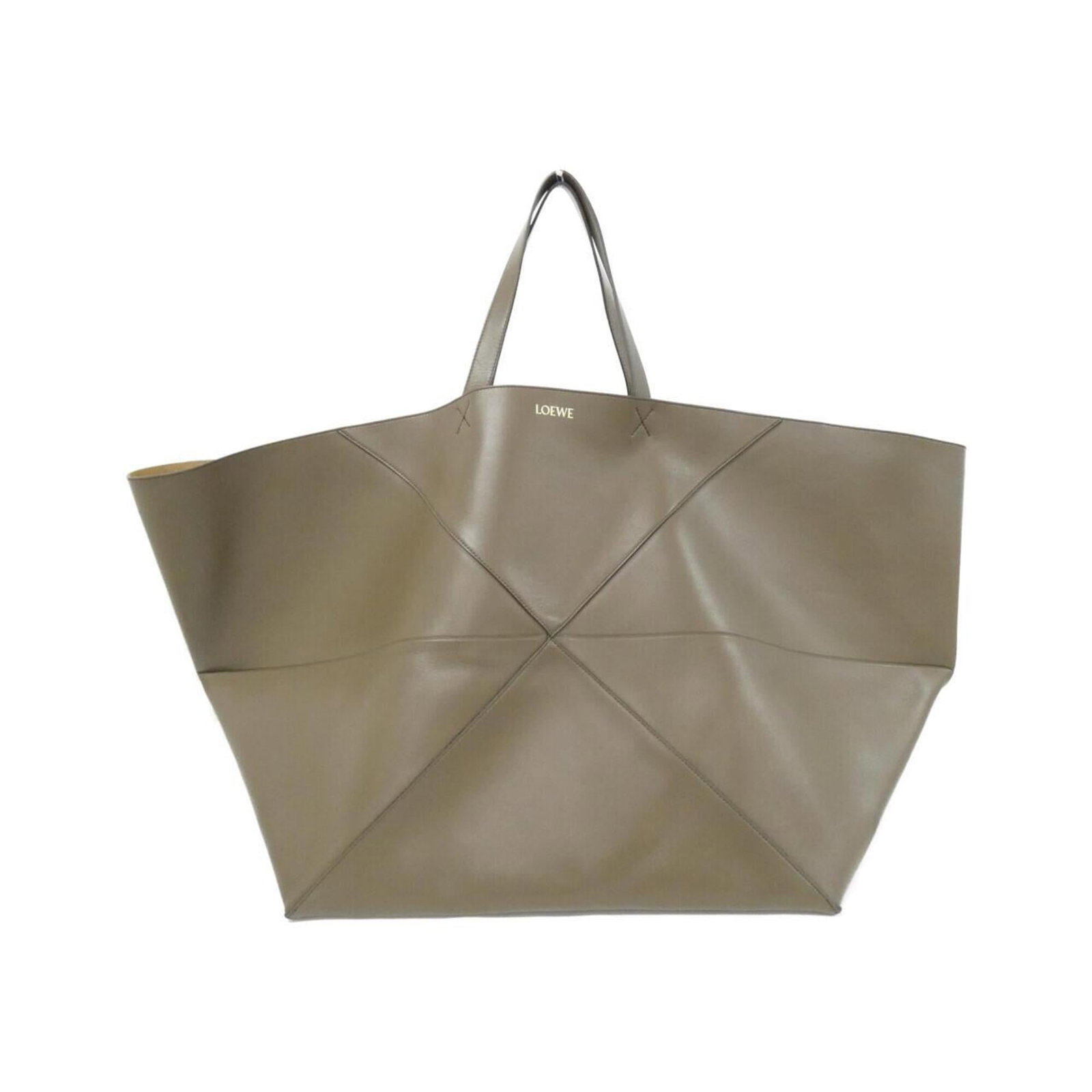 Loewe Tote Bag Leather Handbag: Loewe Tote Bag Leather Handbag The Loewe Tote Bag Leather Handbag is a high-quality, brown calfskin leather tote bag with a classic design. Measuring 45cm x 75cm x 45cm, it offers ample space for