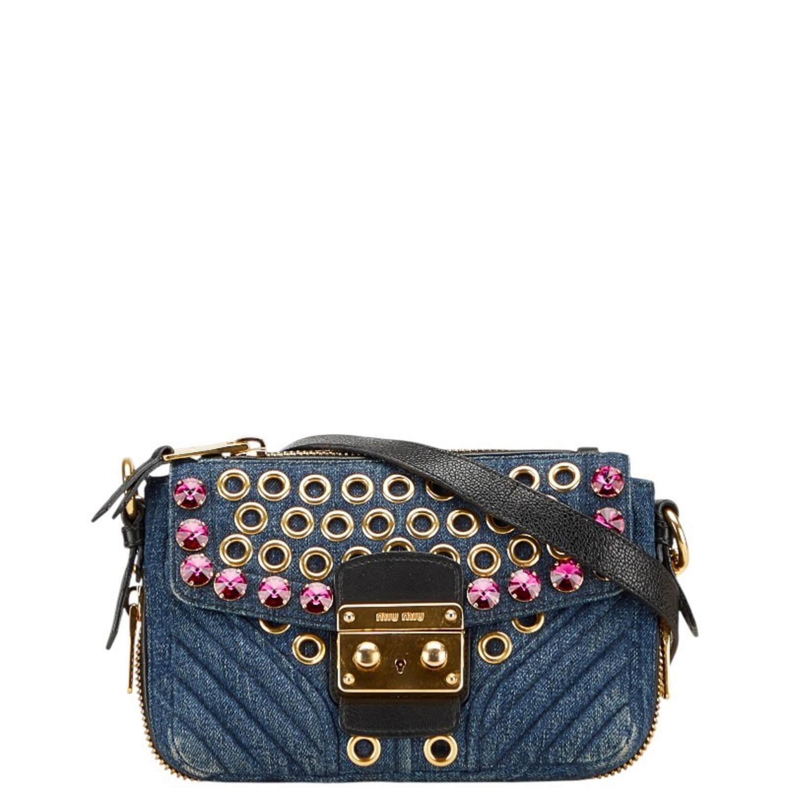 Shoulder bag denim leather Miu: Shoulder bag denim leather Miu Denim and leather come together in a vibrant multi-color shoulder bag from Miu Miu, measuring 14cm x 20cm x 7.5cm. The bag features a 60cm strap drop and is made from a