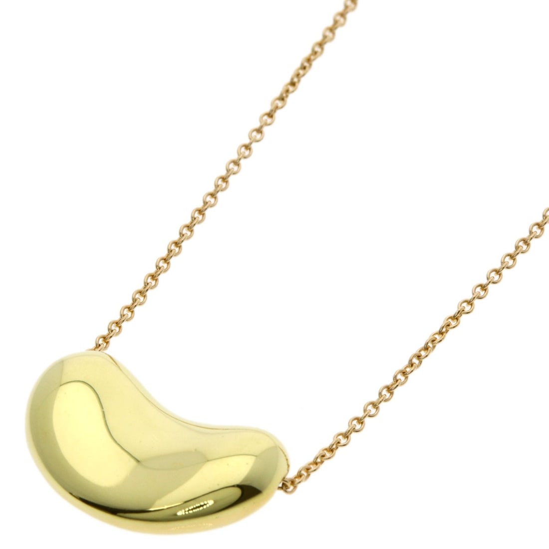 Yellow Gold Tiffany&Co K18 Bean Necklace: Yellow Gold Tiffany&Co K18 Bean Necklace Yellow Gold Tiffany&Co K18 Bean Necklace is a K18 yellow gold necklace with an open closure, measuring 15.9 inches in length. This piece features the iconic Ti