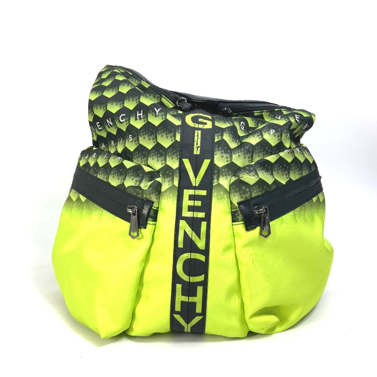 Cloth Givenchy Backpack: Cloth Givenchy Backpack Yellow Cloth Givenchy Backpack with a classic design, measuring 30cm x 40.5cm x 18.5cm, features a signature on the top. Made from cloth material, this backpack has a