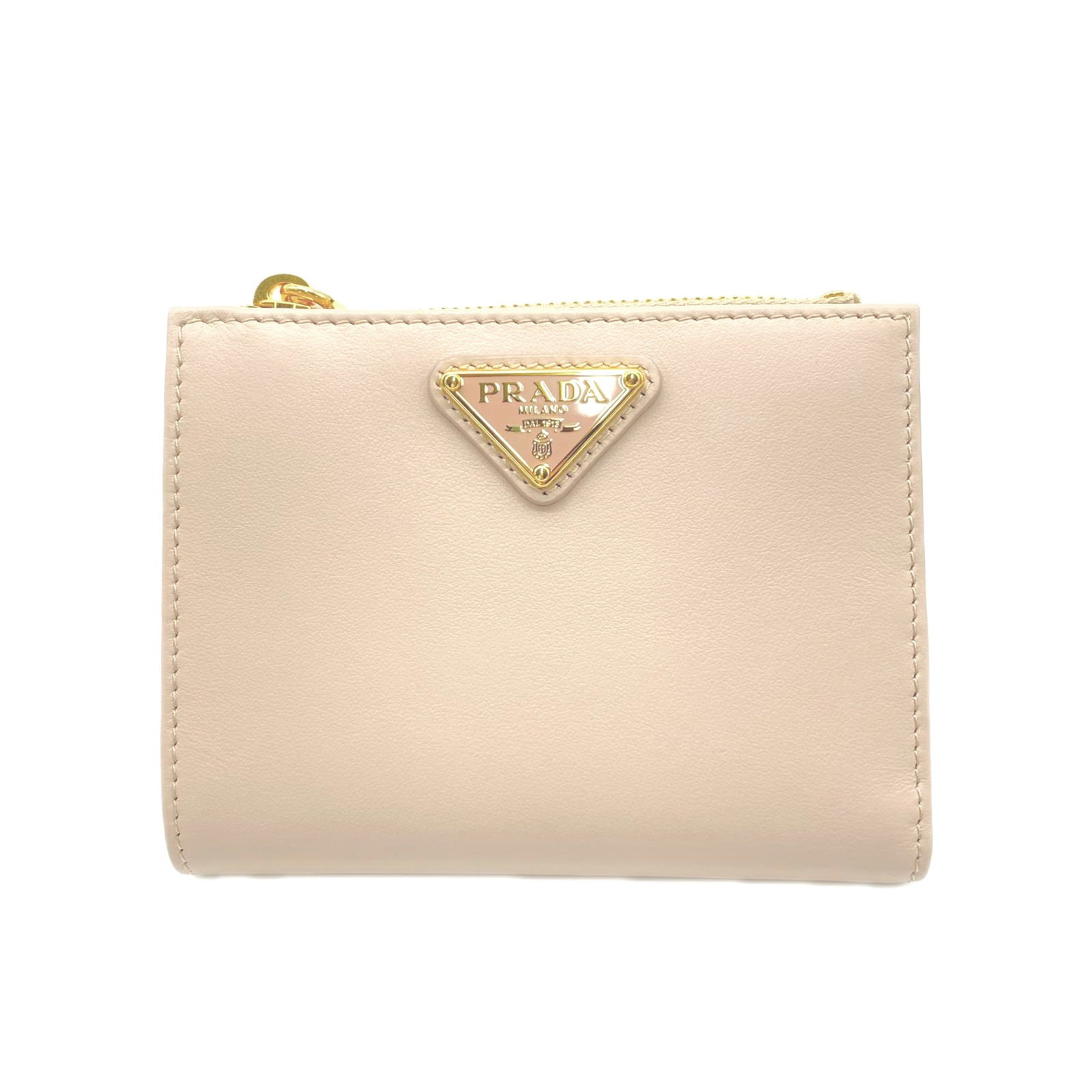 Bi fold leather wallet: Bi fold leather wallet This Prada bi-fold leather wallet boasts a classic beige color and sleek design, with a slim 1.5cm profile that fits comfortably in a pocket or purse. The RFID-blocking
