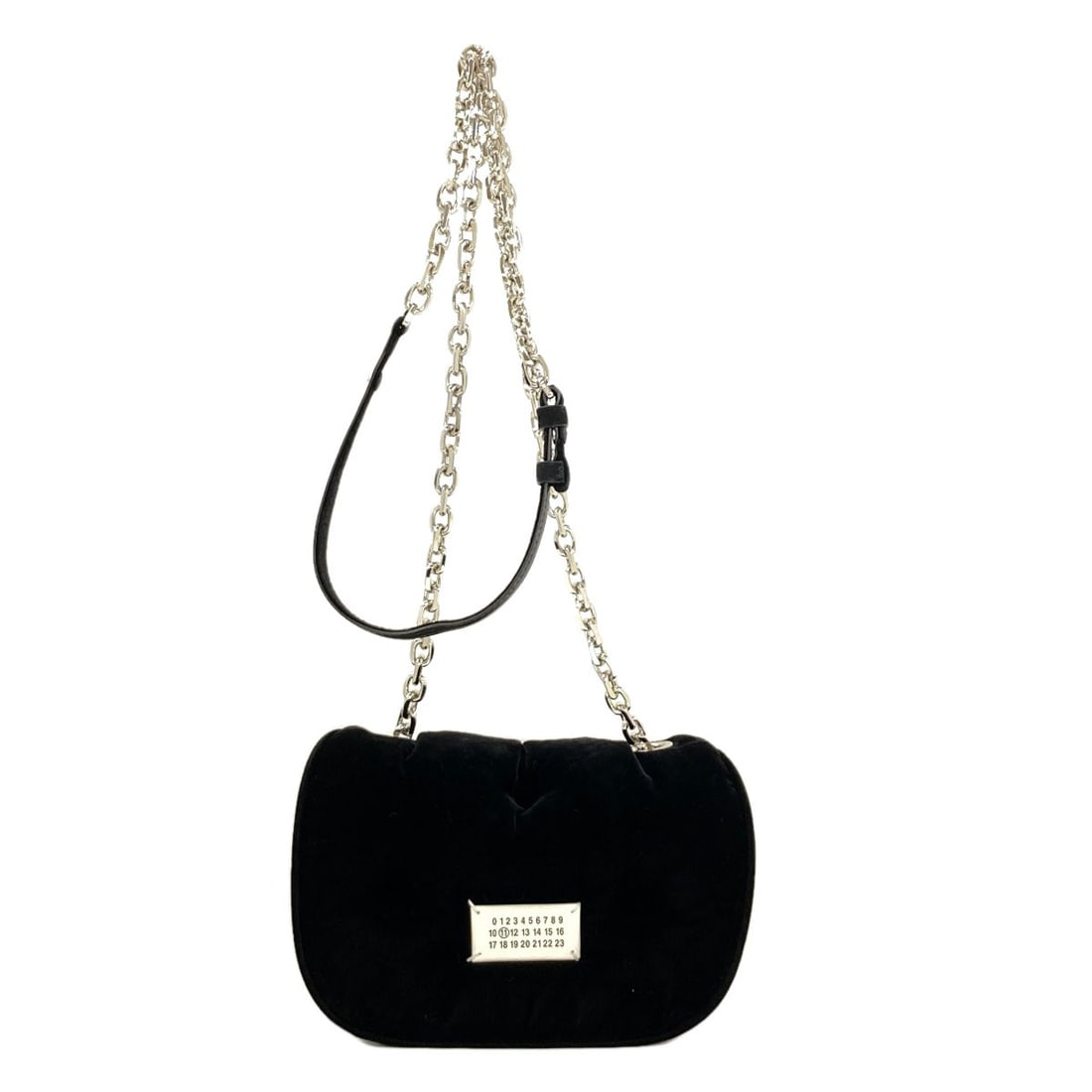 Glam Slam Flap Shoulder Bag Velor: Glam Slam Flap Shoulder Bag Velor Glam Slam Flap Shoulder Bag in black Velor features a striking design with a flap closure, making it a stylish and functional accessory. The black exterior material
