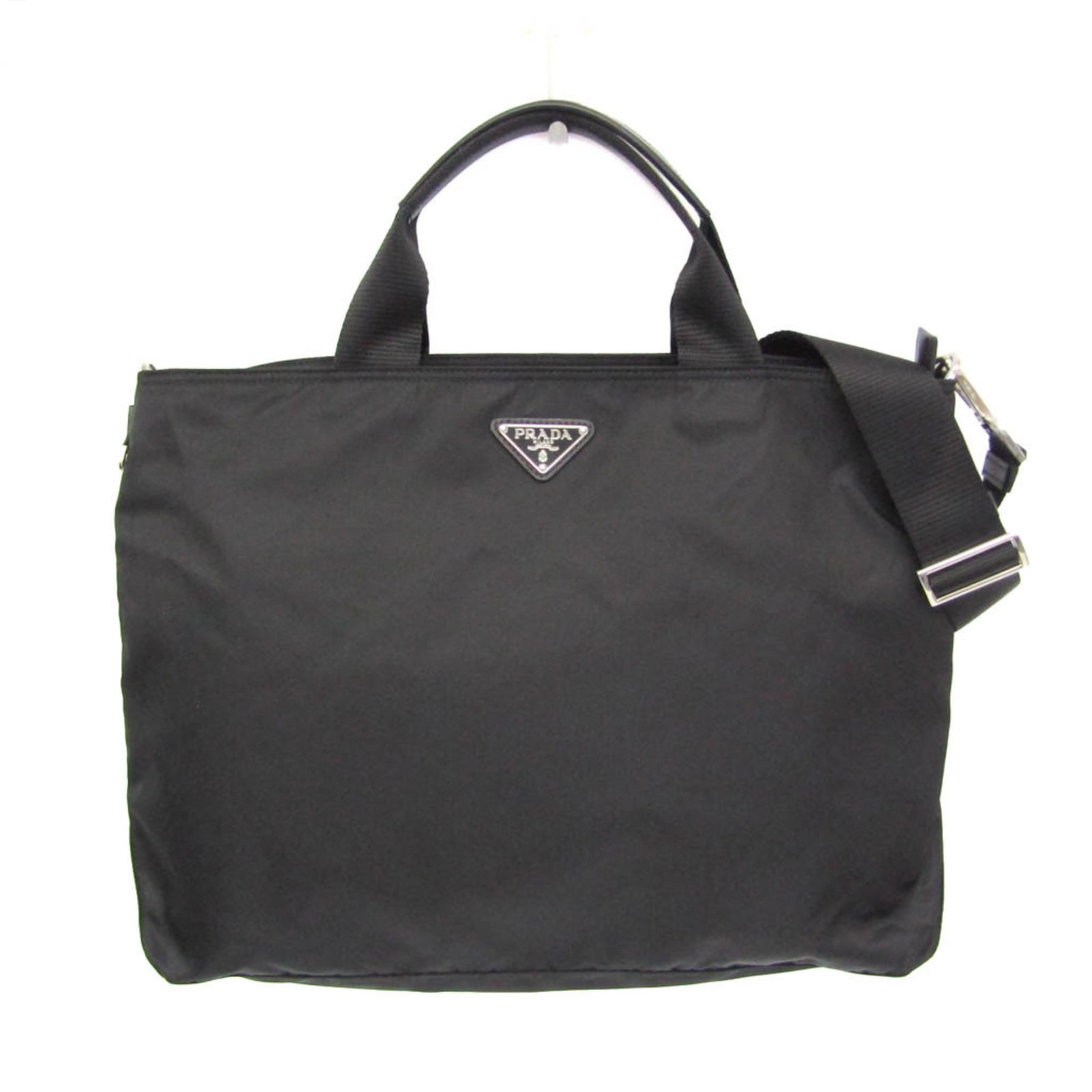 Tote Bag Nylon Prada: Tote Bag Nylon Prada Nylon Prada Tote Bag with a sleek black design and functional details, featuring a sturdy zipper closure and a spacious inner pocket. The bag's durable nylon material and