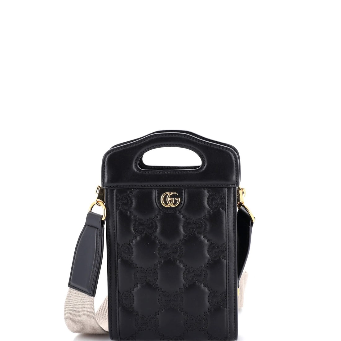 Gucci Top Mini Bag Crossbody Matelasse Leather GG: Gucci Top Mini Bag Crossbody Matelasse Leather GG Black Matelasse Leather Gucci Top Handle Crossbody Bag with Gold Hardware. This mini crossbody bag features Gucci's signature GG Matelasse Leather and