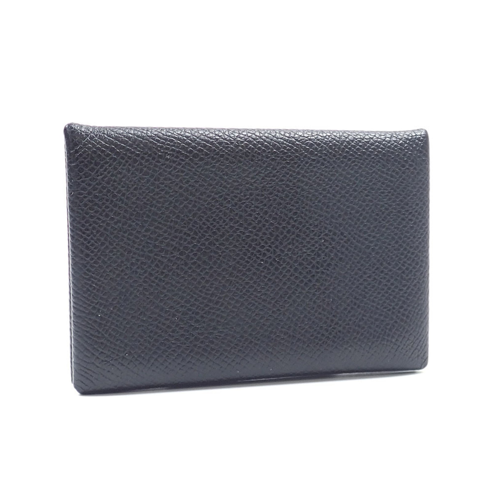 Hermes Coin Purse/ Coin Case Leather: Hermes Coin Purse/ Coin Case Leather Black leather coin purse/coin case from Hermes, measuring 7cm x 10cm x 1cm. Made from high-quality leather, this compact accessory is designed to hold small coins