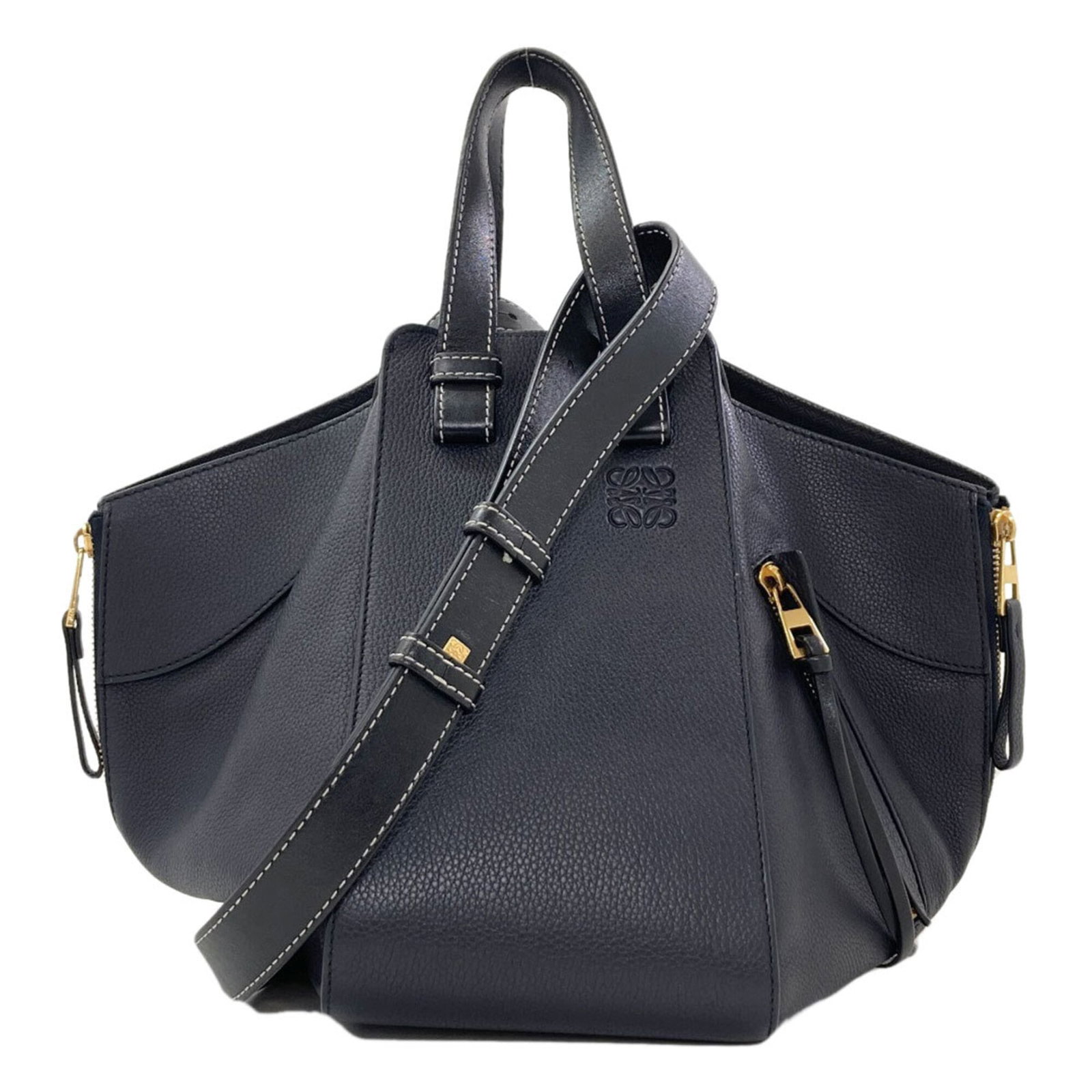 Handbag Leather Handbag: Handbag Leather Handbag Leather craftsmanship shines in this navy calfskin handbag, featuring a sturdy hook closure and adjustable strap length. Measuring 24cm x 14cm x 25cm, the bag's compact size