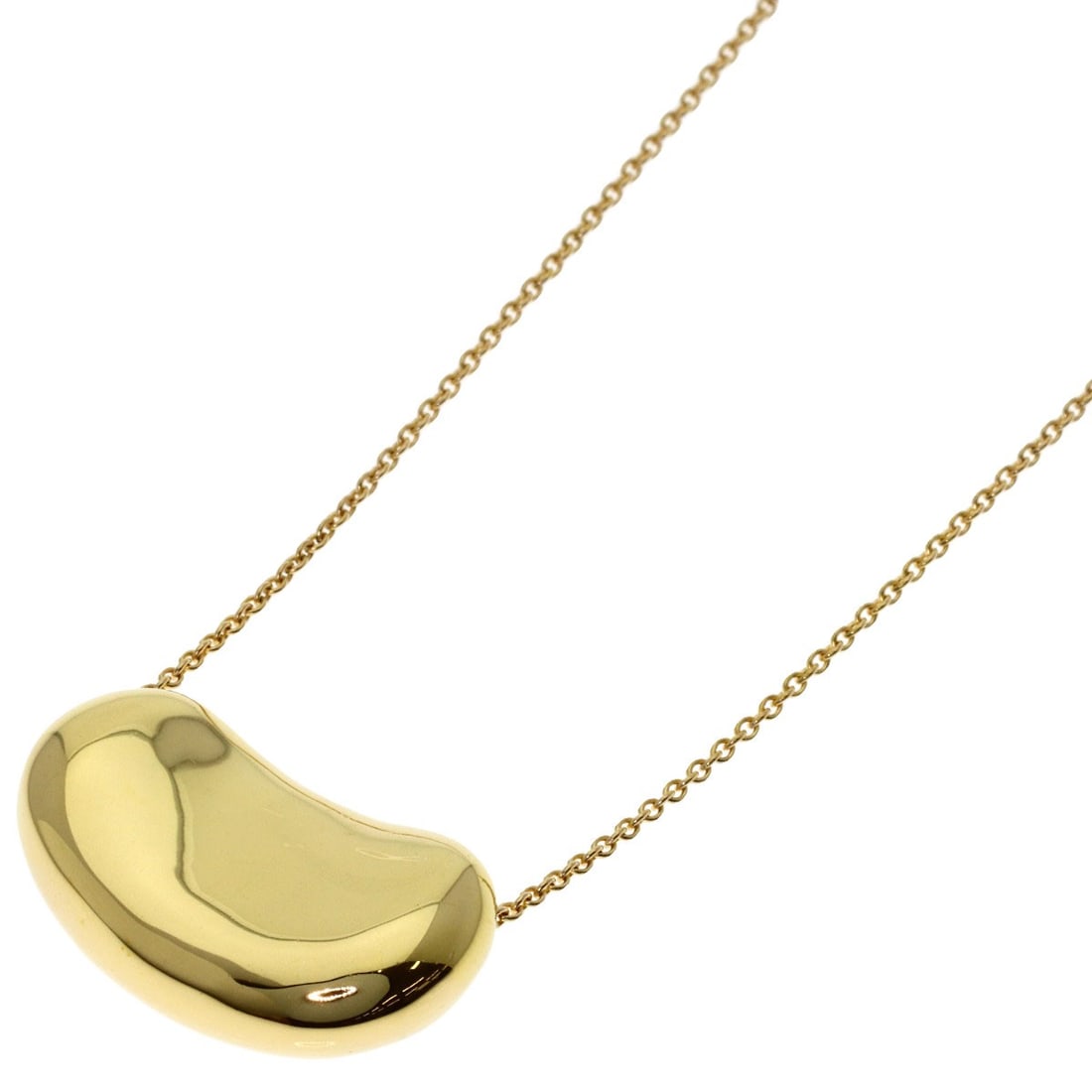 Yellow Gold Tiffany&Co K18 Bean Necklace: Yellow Gold Tiffany&Co K18 Bean Necklace K18 Yellow Gold Tiffany&Co Bean Necklace, a sleek and modern design, features a 16.1inch length of high-quality K18 yellow gold metal. This stylish necklace bo
