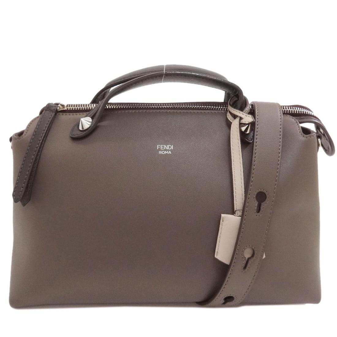 By Fendi Way Leather Handbag 2Way: By Fendi Way Leather Handbag 2Way Fendi Way Leather Handbag 2Way is a stylish and versatile accessory, boasting a sleek gray exterior and interior. The bag features a 2-way design, with a zip closure