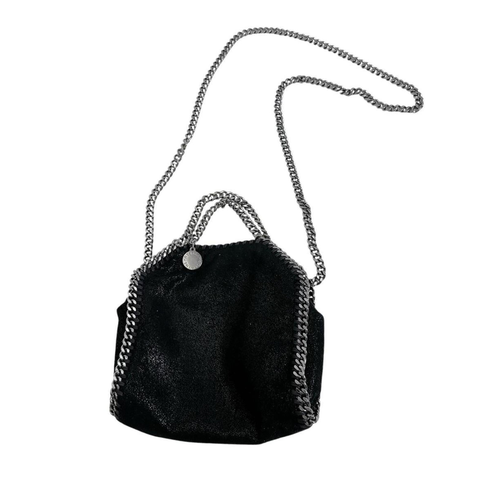 Shoulder bag by Stella McCartney: Shoulder bag by Stella McCartney Stella McCartney's sleek shoulder bag boasts a sophisticated black hue and streamlined design, measuring 17cm x 18.5cm x 6cm. The bag's strap drops a comfortable