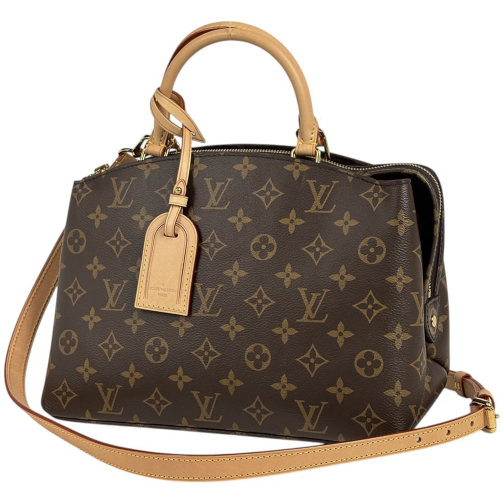 Louis Vuitton Monogram Handbag: Louis Vuitton Monogram Handbag The Louis Vuitton Monogram Handbag is a timeless piece, boasting the iconic monogram pattern in rich brown hues. Measuring 18cm x 29cm x 12.5cm, this compact handbag is