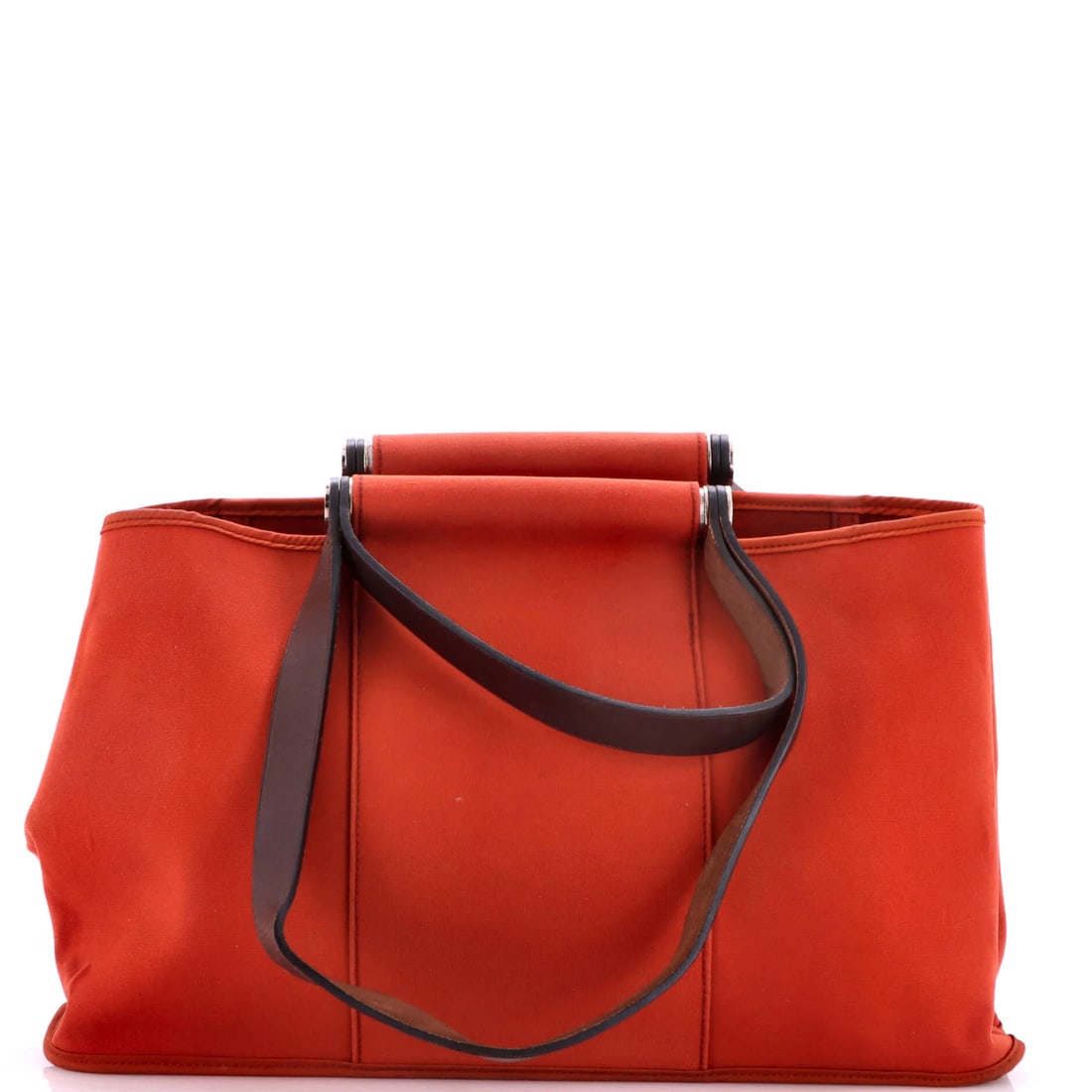 Cabag Elan Hermes 39 Toile Leather: Cabag Elan Hermes 39 Toile Leather Cabag Elan Hermes 39 Toile Leather is a unique and stylish tote bag featuring a striking orange exterior with a mix of brown and orange canvas interior. The bag's