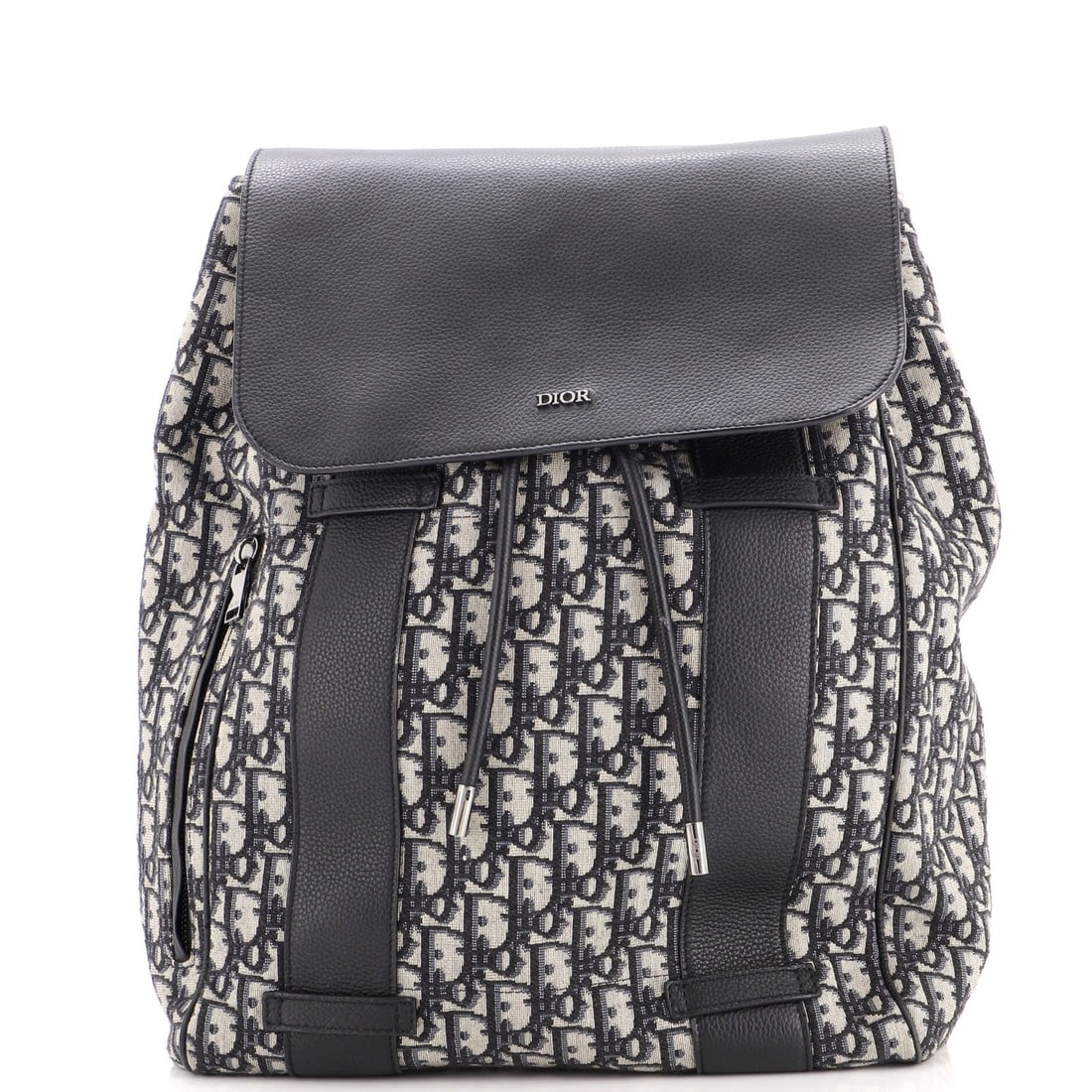 Backpack Canvas Christian Dior Flap Leather Oblique: Backpack Canvas Christian Dior Flap Leather Oblique Blue canvas and leather Christian Dior Flap Backpack Oblique features a scuffed exterior with minor corner wear and marks on the handles/straps. The