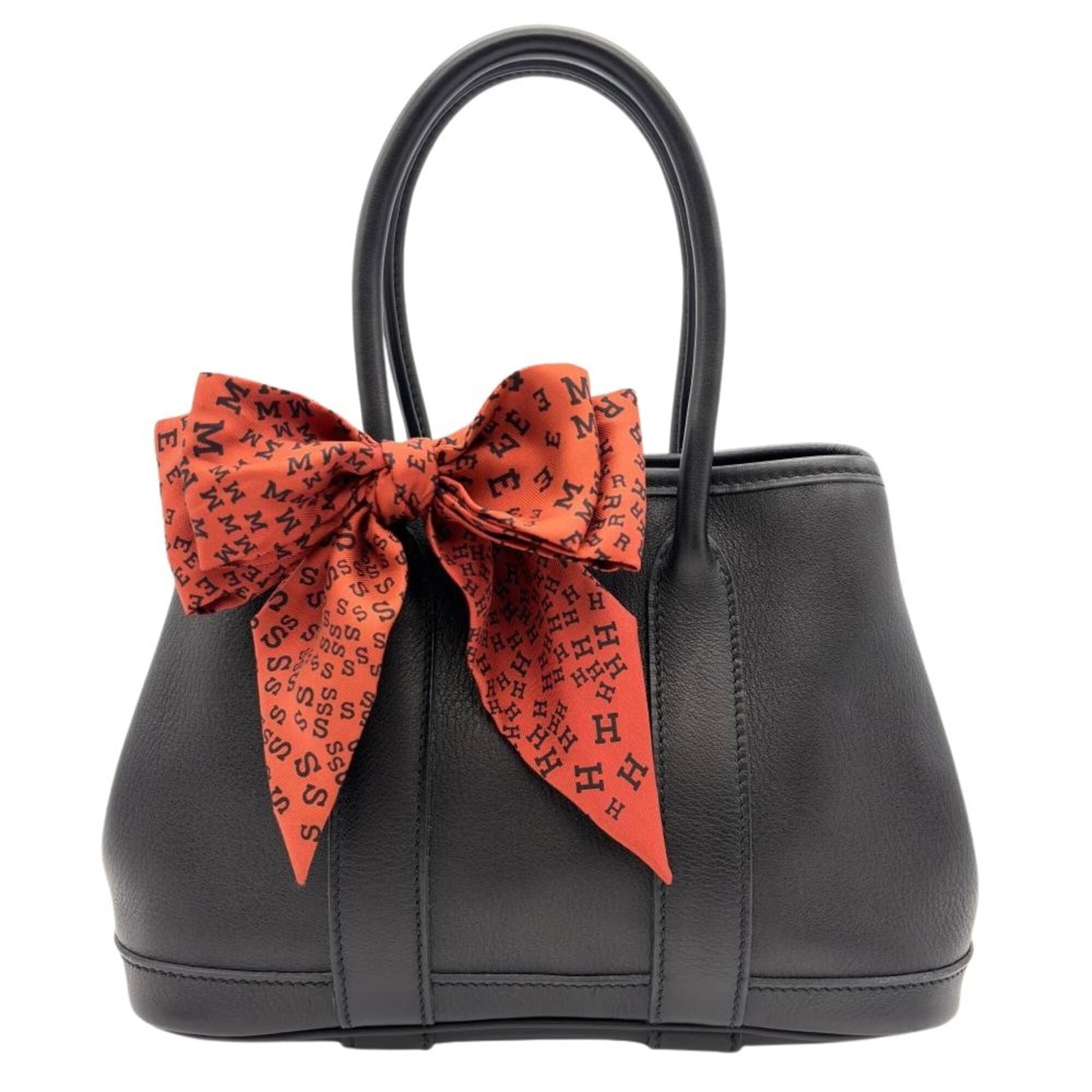 Swift Leather Handbag Hermes: Swift Leather Handbag Hermes Swift Leather Handbag by Hermes, crafted from high-quality Swift leather, features a sleek black design with precise dimensions of 16cm x 23cm x 10.5cm. This stylish