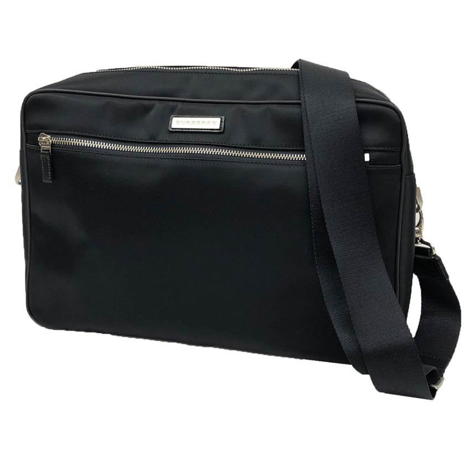 Nylon Messenger Bag Burberry Shoulder: Nylon Messenger Bag Burberry Shoulder Nylon Messenger Bag with a classic Burberry shoulder design, this black bag features a durable nylon material and a sleek, compact size. The 24cm x 36cm x 8cm