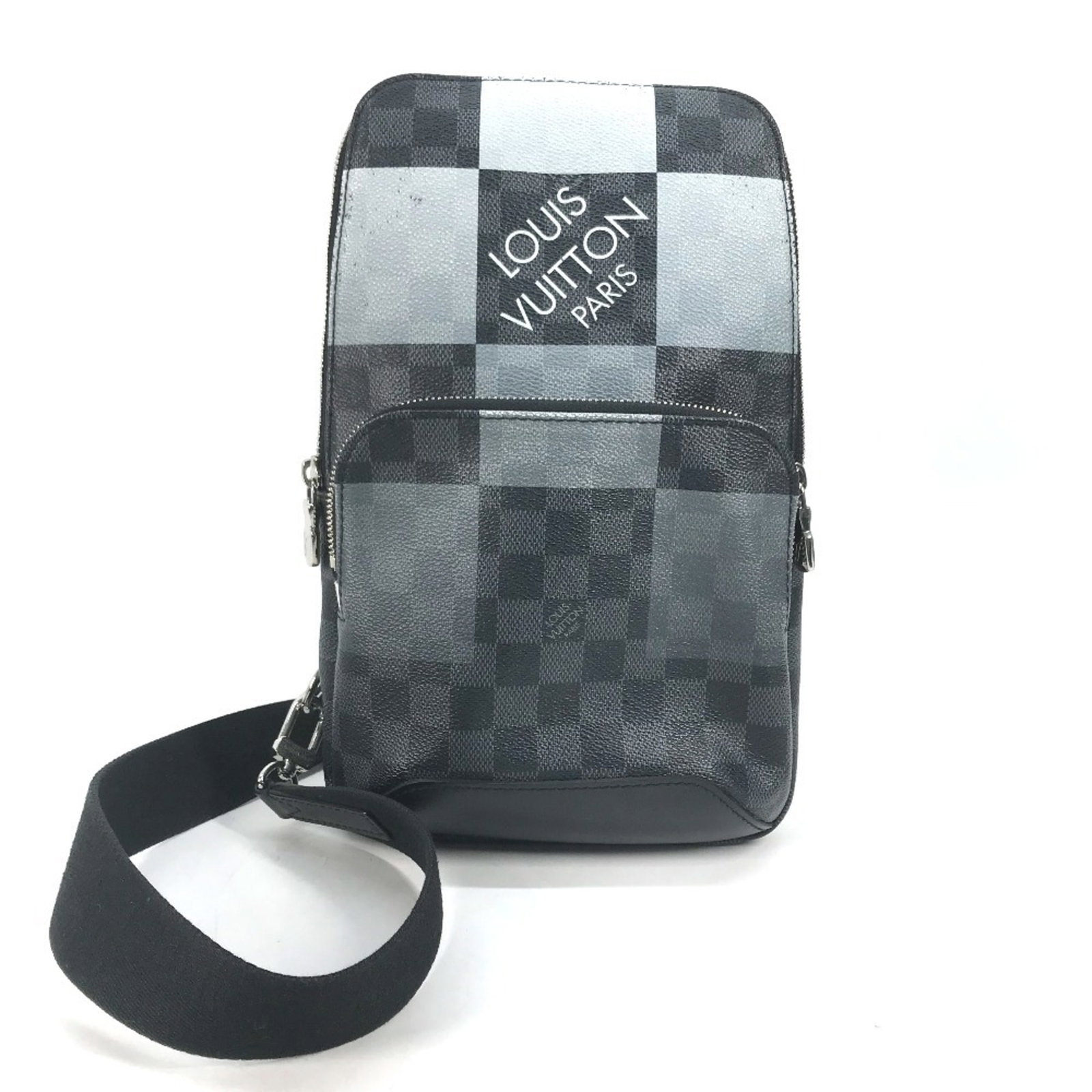 Canvas sling bag by Louis Vuitton: Canvas sling bag by Louis Vuitton Canvas sling bag by Louis Vuitton, featuring a sleek black, galle, and gray color combination, with an open zipper pocket for added convenience. This stylish