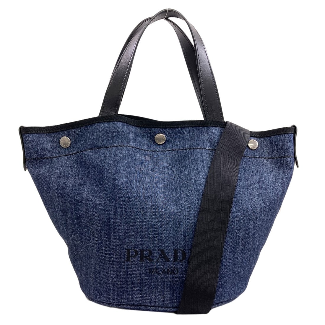 Denim Prada Tote Bag 2Way: Denim Prada Tote Bag 2Way Navy Prada Denim Tote Bag with 2Way Design, featuring a detachable strap pouch and a durable denim exterior. The bag measures 10.4 inches in height and 9.1-15.7 inches in