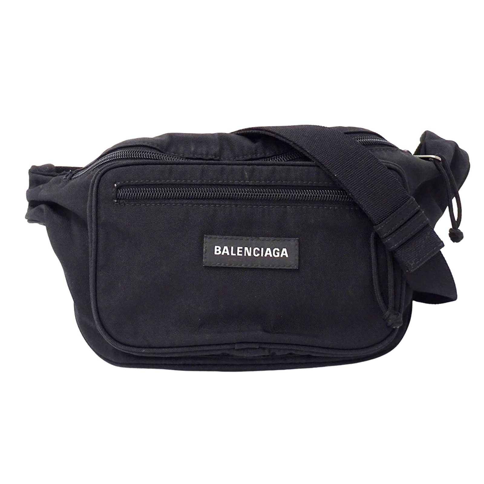 Handbag Balenciaga Nylon Sling: Handbag Balenciaga Nylon Sling Balenciaga Nylon Sling in Black. Made from high-quality nylon, this sleek sling bag features a classic design with a 19cm x 27cm x 7cm size. Perfect for everyday carry,